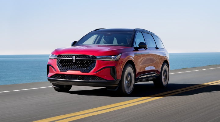 A 2024 Lincoln Nautilus® SUV is being driven on a seaside roadway. | Kindle Lincoln in Cape May Court House NJ