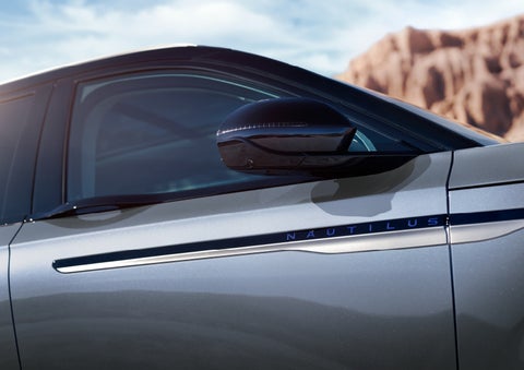 Blue lettering on the side of the vehicle that reads nautilus indicates the available hybrid powertrain. | Kindle Lincoln in Cape May Court House NJ