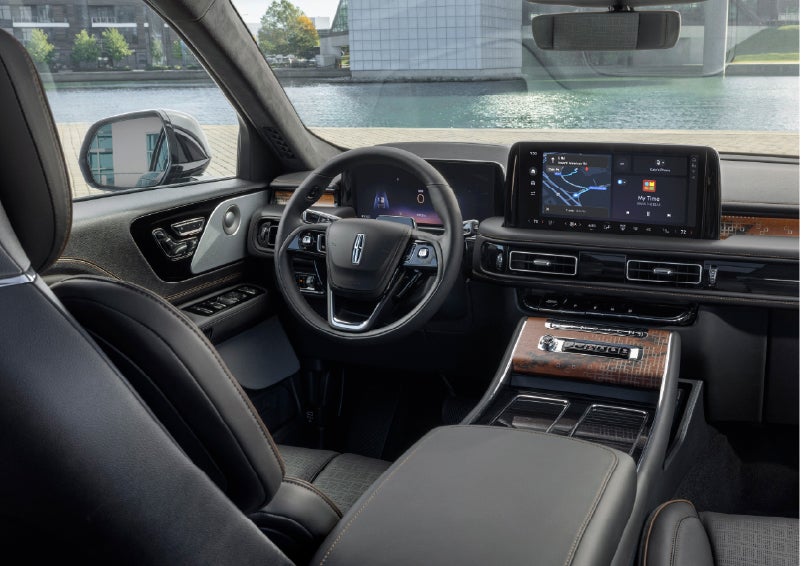 The interior of the 2026 Lincoln Aviator® SUV is shown parked with a view of a harbor through the windshield. | Kindle Lincoln in Cape May Court House NJ