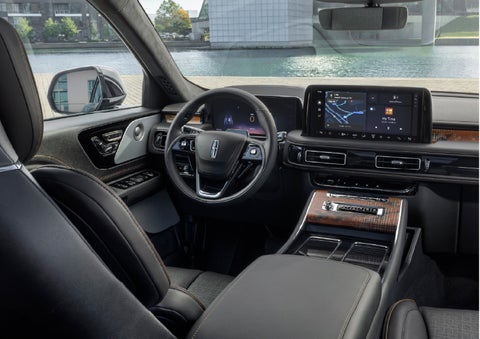 The interior of the 2026 Lincoln Aviator® SUV is shown parked with a view of a harbor through the windshield. | Kindle Lincoln in Cape May Court House NJ